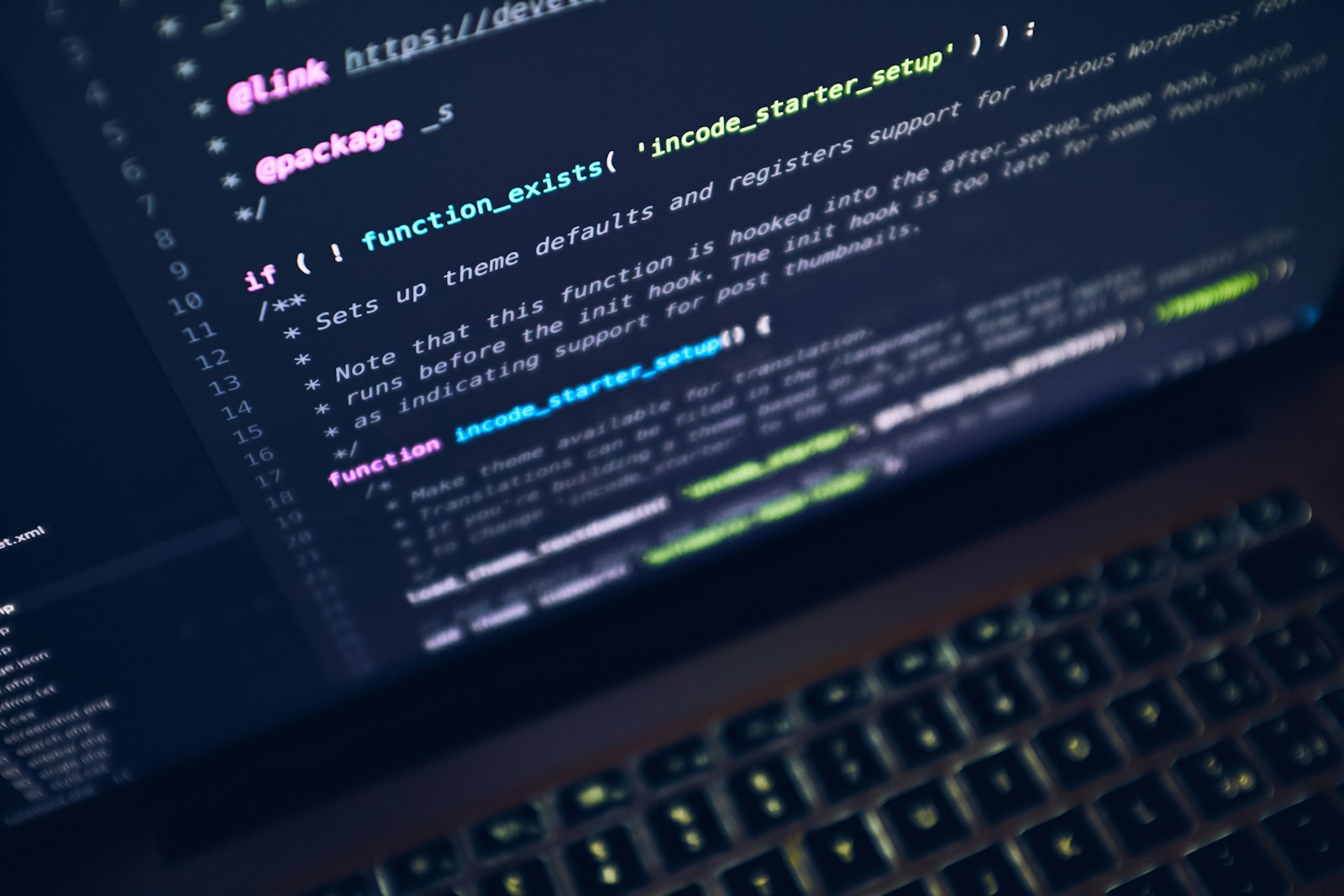 A close-up of source code on a laptop screen, representing legacy code under review.